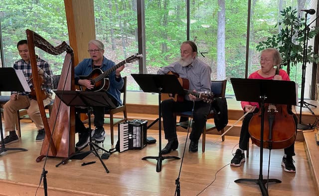 Musicians playing instruments at John Calvin Presbyterian Church.