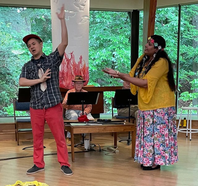 Performers at John Calvin Presbyterian Church engaging in a cultural presentation.